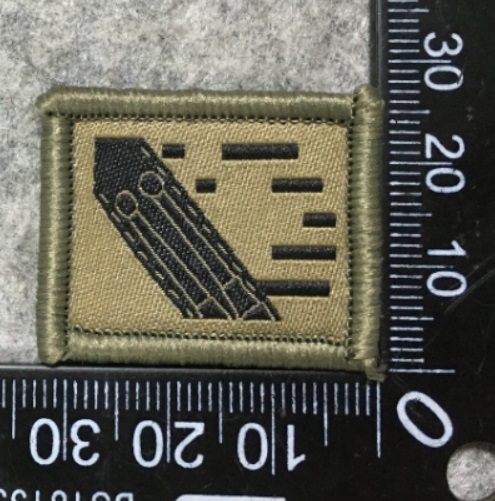 Badge brodé personnalisé réalisé pour une section de l’armée suisse