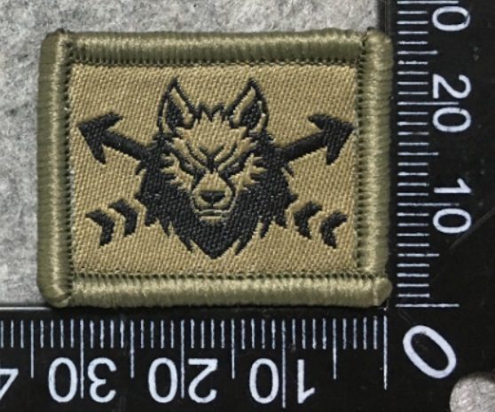 Badge brodé personnalisé réalisé pour une section de l’armée suisse