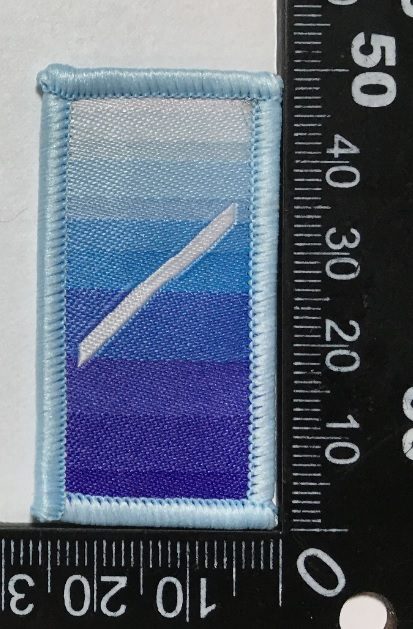 Badge brodé personnalisé réalisé pour une section de l’armée suisse