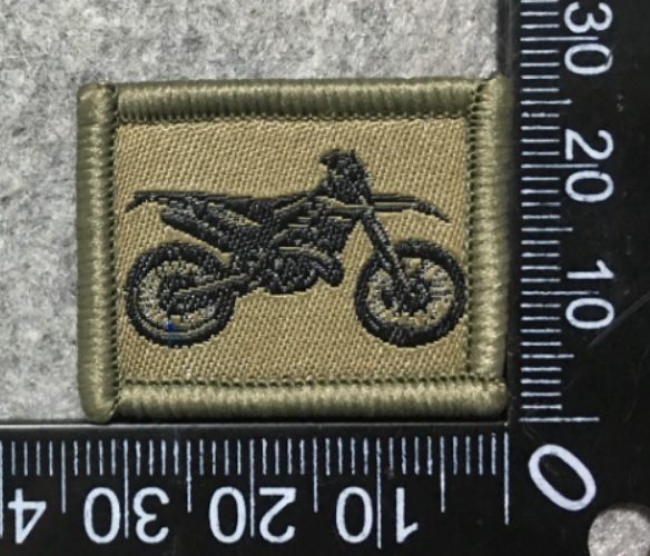 Badge brodé personnalisé réalisé pour une section de l’armée suisse