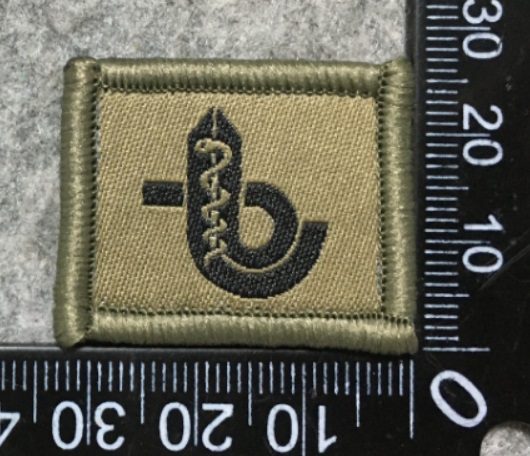 Badge brodé personnalisé réalisé pour une section de l’armée suisse