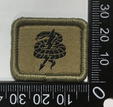 Badge brodé personnalisé réalisé pour une section de l’armée suisse